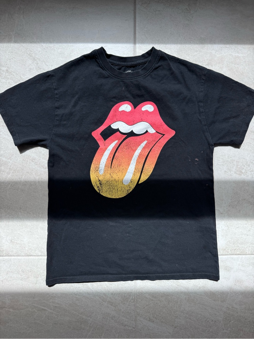 the Rolling Stones Black Tee with Red and White Tongue Graphic